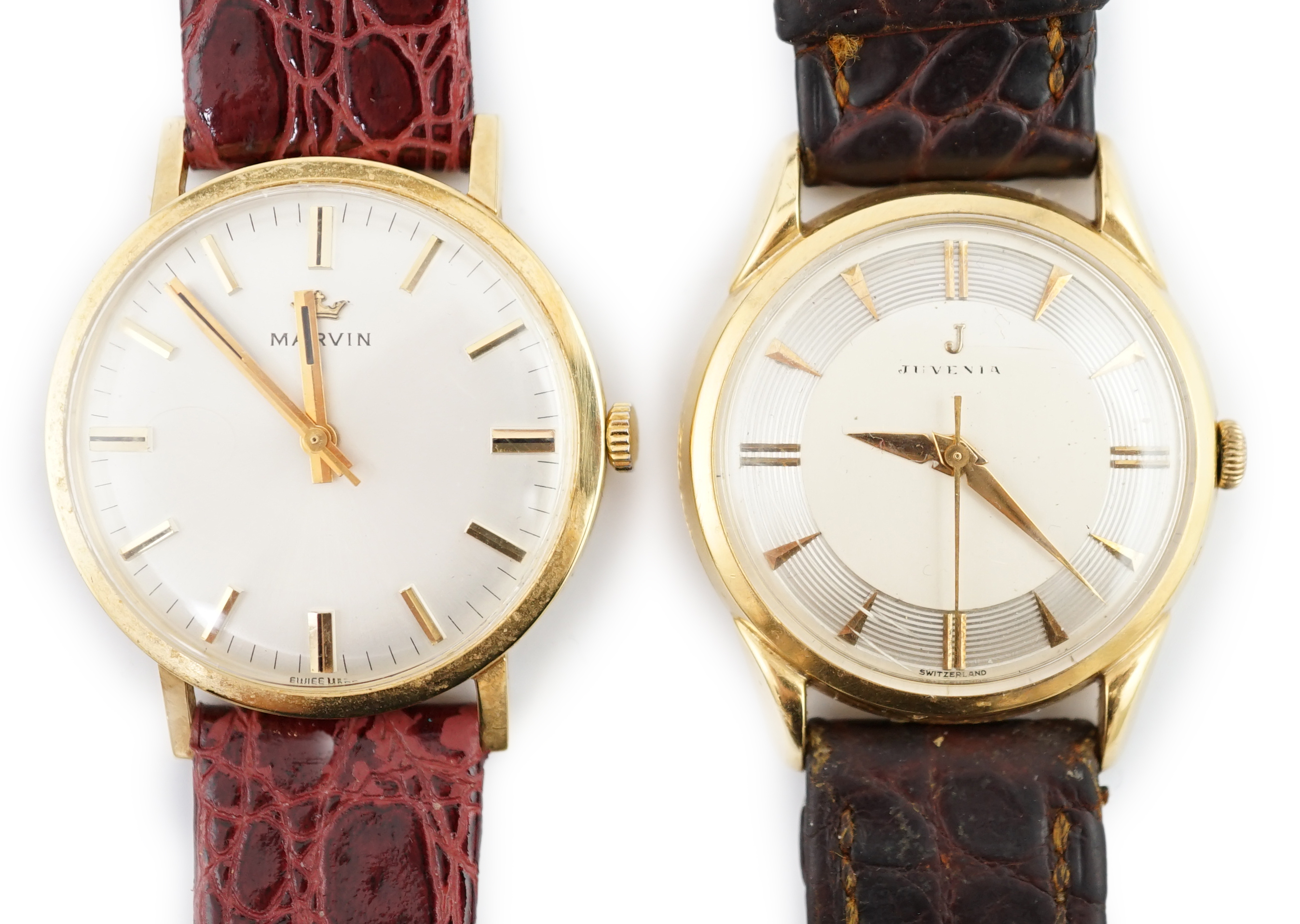 A gentleman's 1960's 18ct? gold Juvenia manual wind wrist watch, on a leather strap and a gentleman's 18ct? gold Marvin manual wind wrist watch, on a leather strap